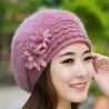 Knitted beret - a warm fur hat with decorative flowersHats & Caps