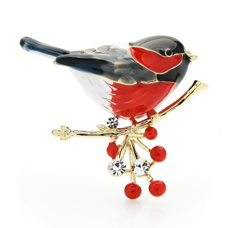 A bird sitting on a branch - crystal broochBrooches
