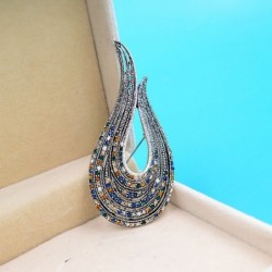 U-shaped brooch - with crystal decorationsBrooches