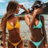 Sexy bikini set - low waist - with decorative metal ringsBeachwear