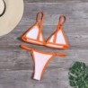 Sexy bikini set - low waist - with decorative metal ringsBeachwear