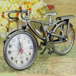 Vintage bike with clockClocks
