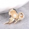 Vintage bird-shaped brooch with pearlBrooches