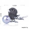 Vintage bird-shaped brooch with pearlBrooches