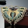 Vintage brooch with crystal butterflyBrooches