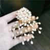 Branch with oval pearls - fashionable broochBrooches