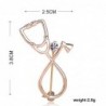 Stethoscope shaped brooch with crystalBrooches