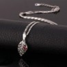 Leaf shaped pendant with crystals - stainless steel necklaceNecklaces