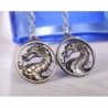 Round metal keychain with dragonKeyrings