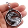 Round metal keychain with dragonKeyrings
