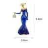 Fashionable brooch - a woman in a blue dress with a crystal handbagBrooches
