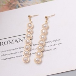 Elegant long golden earrings - geometric metal with pearlsEarrings