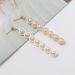 Elegant long golden earrings - geometric metal with pearlsEarrings