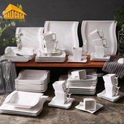 Elegant tableware - white porcelain dinner set - cups - saucers - platesCutlery