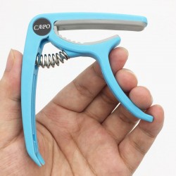 Plastic guitar capo - for 6-string instrumentGuitars