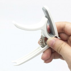 Plastic guitar capo - for 6-string instrumentGuitars