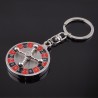 Spinning Russian roulette - rotatable round keychainKeyrings
