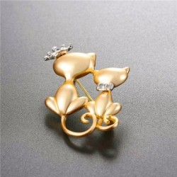 Double cat with crown - broochBrooches