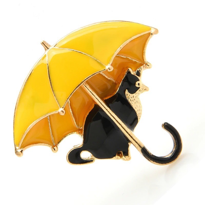 Cat under umbrella - broochBrooches