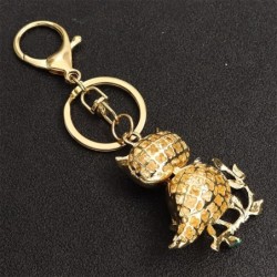Golden crystal owl - green leaves - keychainKeyrings