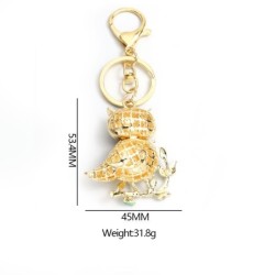 Golden crystal owl - green leaves - keychainKeyrings