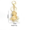 Golden crystal owl - green leaves - keychainKeyrings