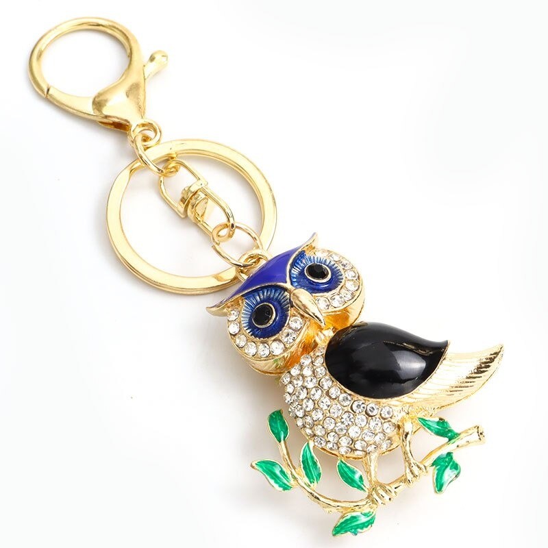 Golden crystal owl - green leaves - keychainKeyrings