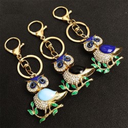 Golden crystal owl - green leaves - keychainKeyrings