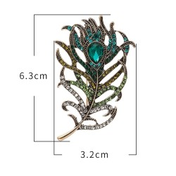 Crystal feather shaped broochBrooches