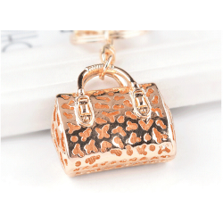 Golden crystal bag - keychainKeyrings