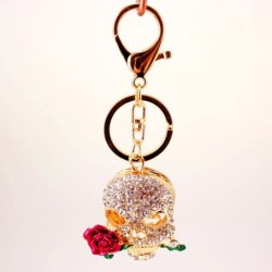 Golden crystal skull with rose - keychainKeyrings