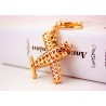 Crystal airplane - gold keychainKeyrings