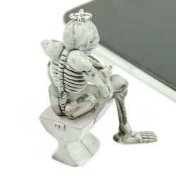 Skeleton sitting on the toilet - rubber keychainKeyrings