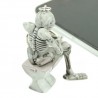 Skeleton sitting on the toilet - rubber keychainKeyrings