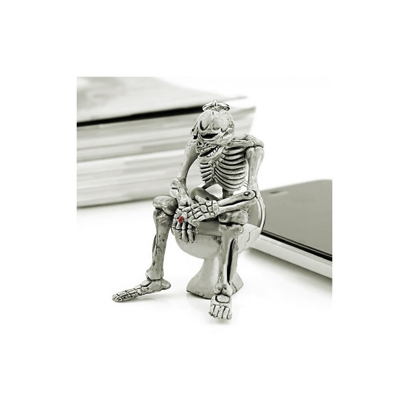Skeleton sitting on the toilet - rubber keychainKeyrings