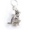 Skeleton sitting on the toilet - rubber keychainKeyrings
