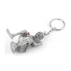Skeleton sitting on the toilet - rubber keychainKeyrings