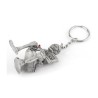 Skeleton sitting on the toilet - rubber keychainKeyrings
