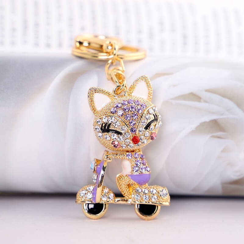 Fox on the bike - crystal keychainKeyrings
