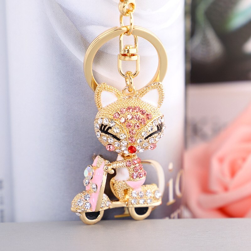Fox on the bike - crystal keychainKeyrings