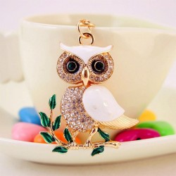 Sitting on the branch white crystal owl - keychainKeyrings