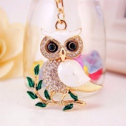 Sitting on the branch white crystal owl - keychainKeyrings
