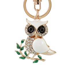 Sitting on the branch white crystal owl - keychainKeyrings