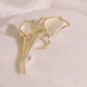 White tulip shaped brooch - with crystalsBrooches
