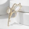 White tulip shaped brooch - with crystalsBrooches