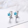Round silver earrings with a blue crystal starEarrings