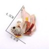 Crystal goldfish with a pearl - elegant broochBrooches