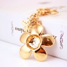 Daisy flower with pearl and crystal - keyringKeyrings