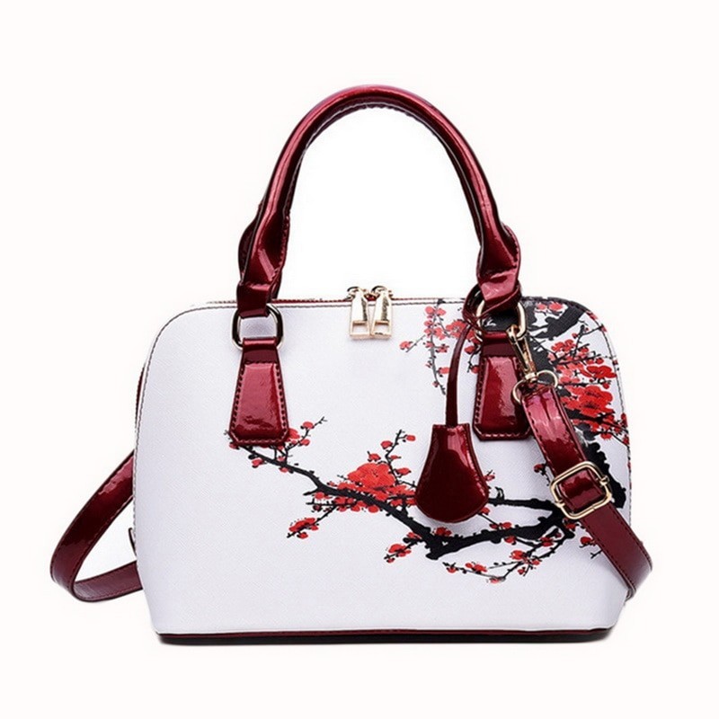 Leather bag with floral printHandbags