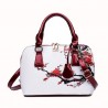 Leather bag with floral printHandbags
